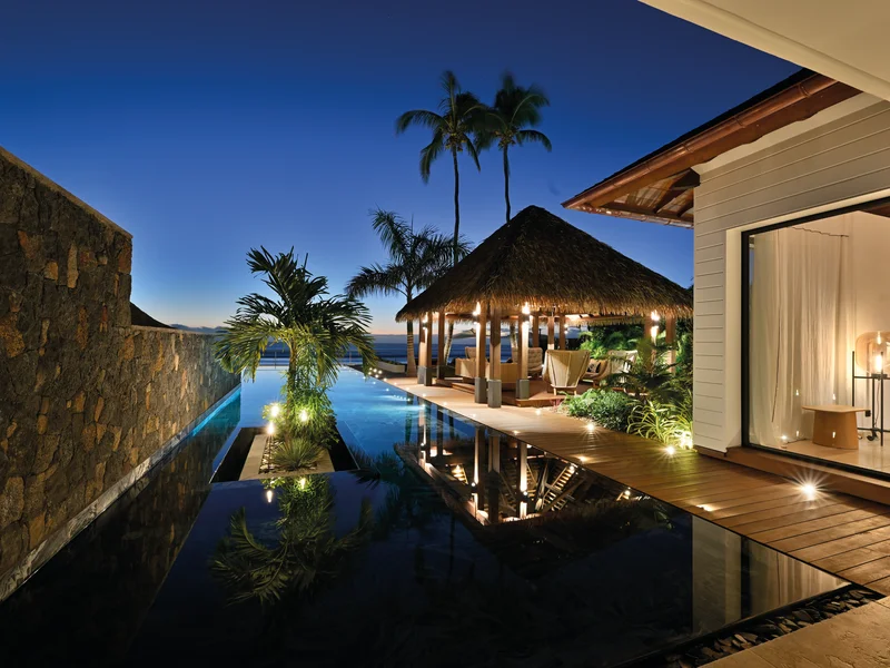 Architecture contemporaine d'une villa luxe Réunion avec bardage bois